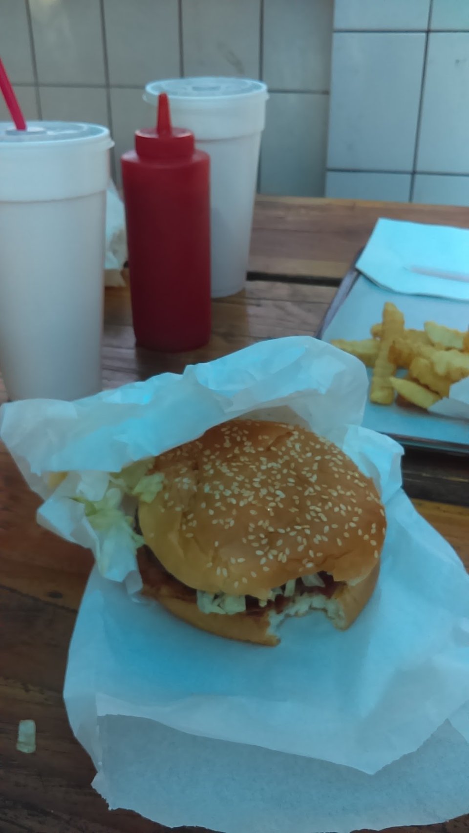 Fast-food menu with sides, desserts, and drinks.