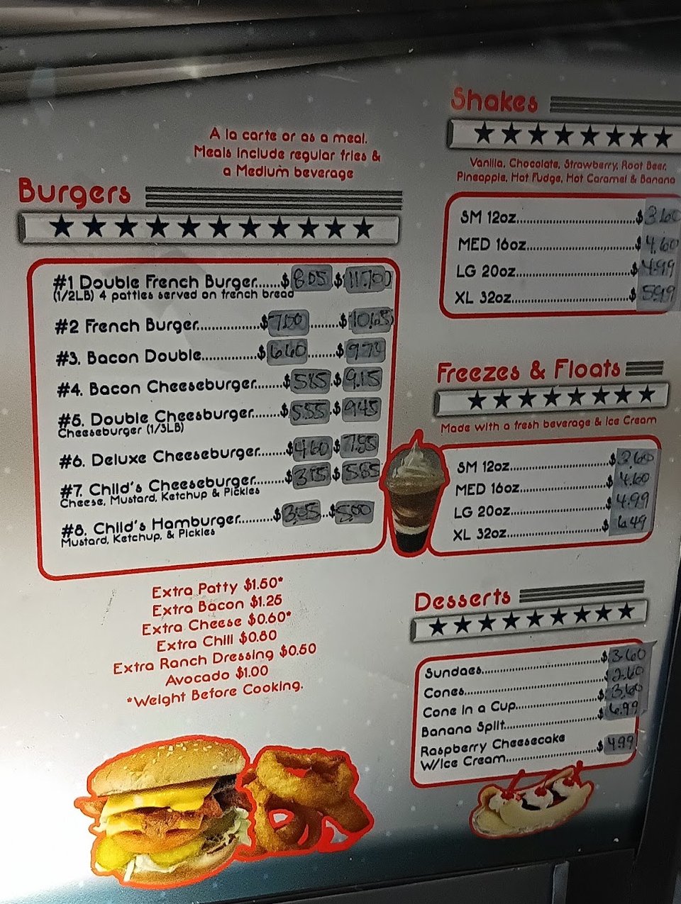 Menu board showing shakes, fries, and sandwiches.