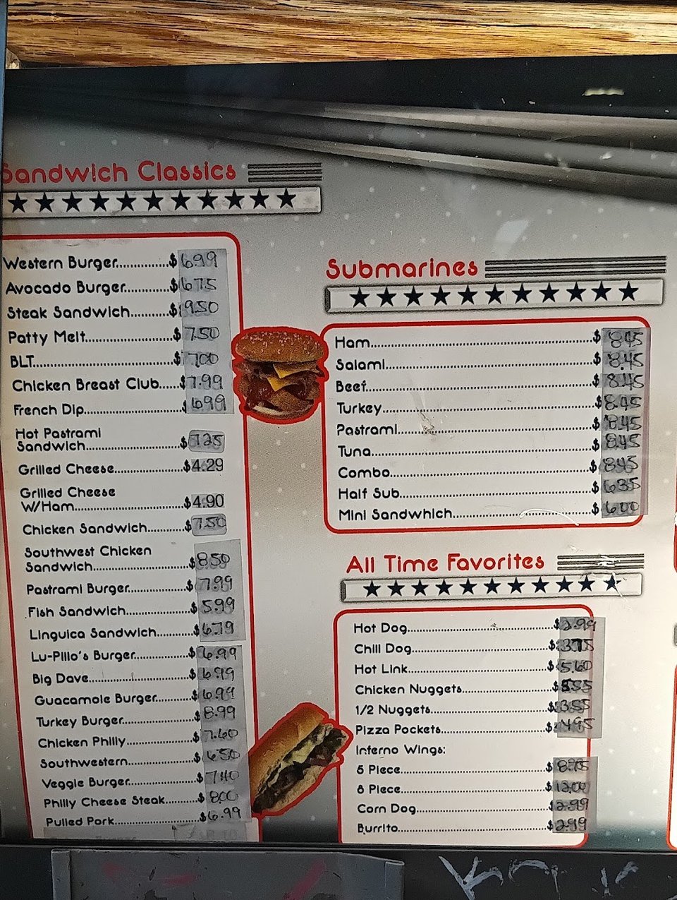 Menu featuring burgers, fries, and root beer.